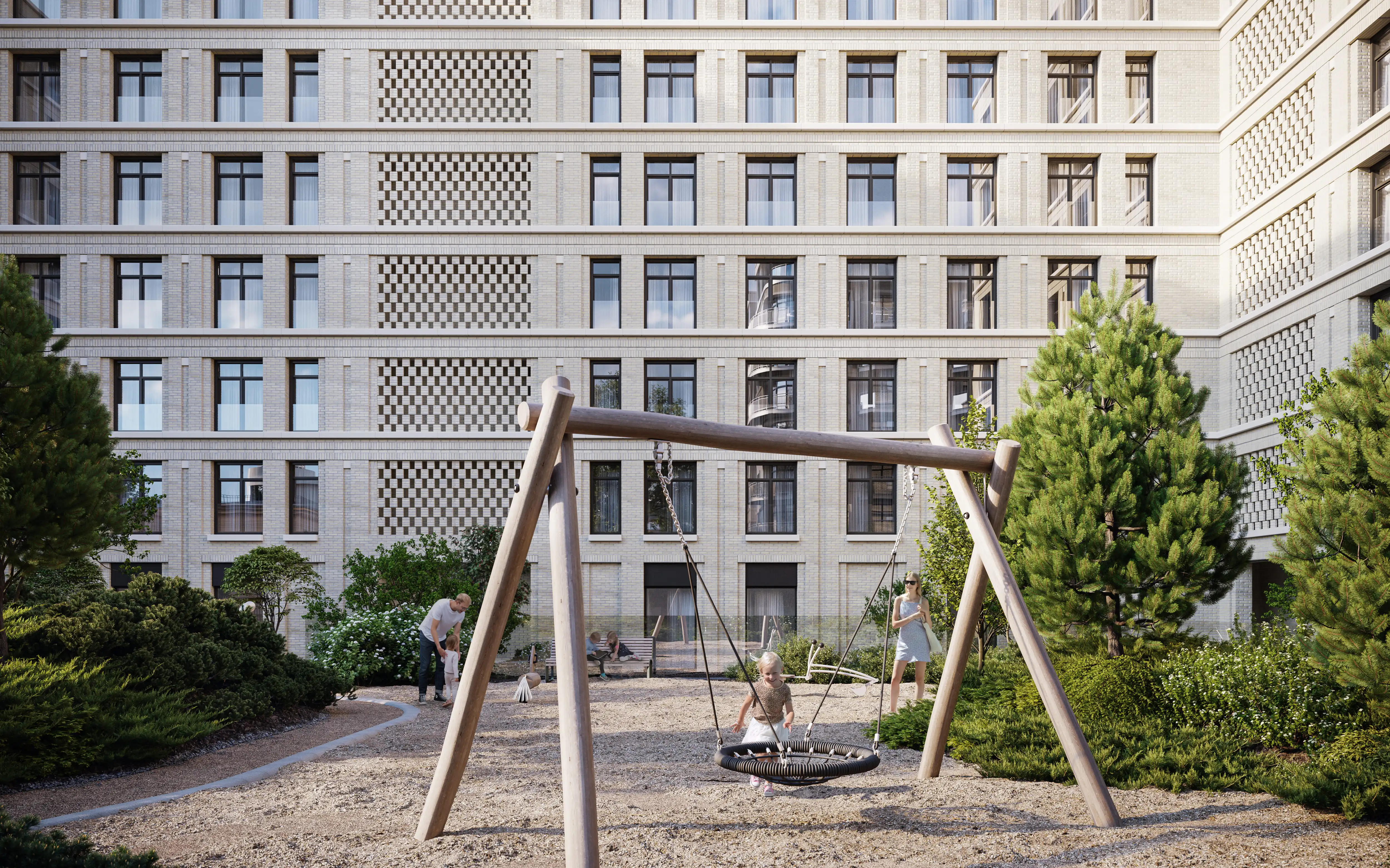 Благоустроенная детская площадка во дворе жилого комплекса «Визионер» с современными качелями и зелеными насаждениями